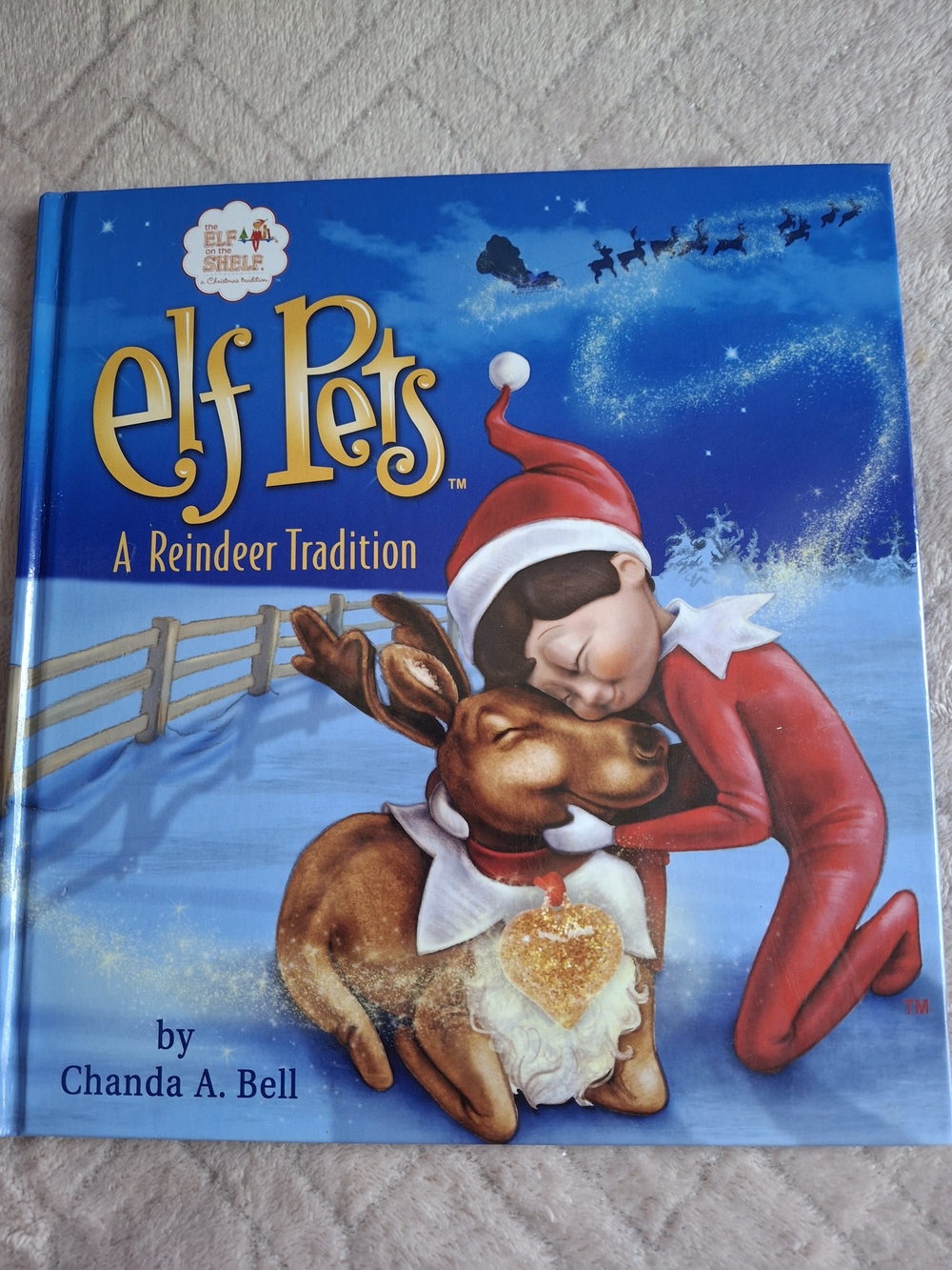 Elf Pets A Reindeer Tradition by Chanda A. Bell - Blue Cover